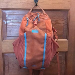 REI Tarn 18 backpack dark orange
